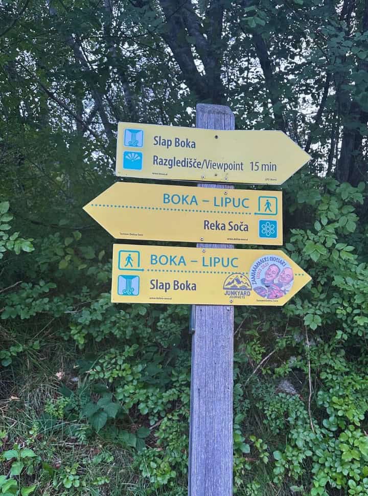 trail sign pointing into the direction of Slap boka and Reka Soca in Slovenia 