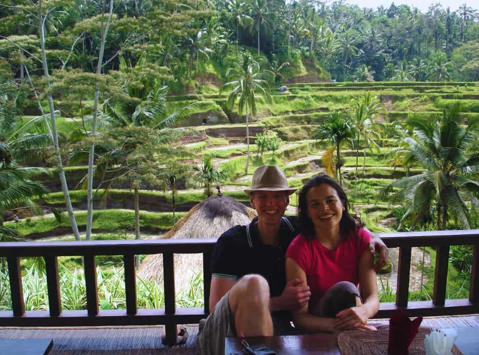 couple sitting at a restaurant with full view of the rice terraces of Tegalalang, nearby Ubud Bali