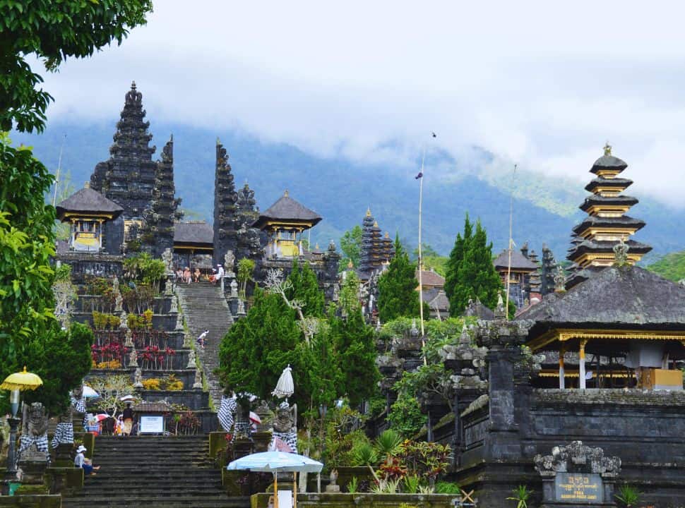 terraced temple with mountain in the back, known as the mother temple of Bali: Besakih Temple