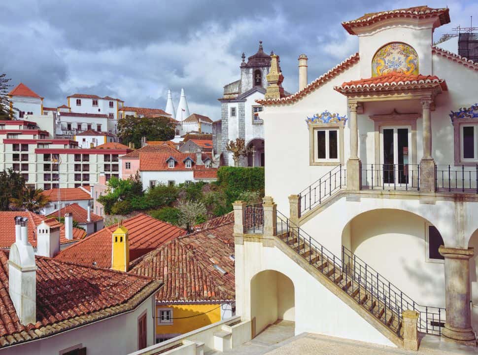 Sintra Town Portugal with white traditional buildings and the national palace in the background