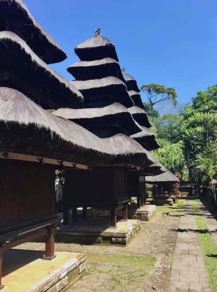 row of tall meru, a multi tiered shrine tower known in Balinese temples