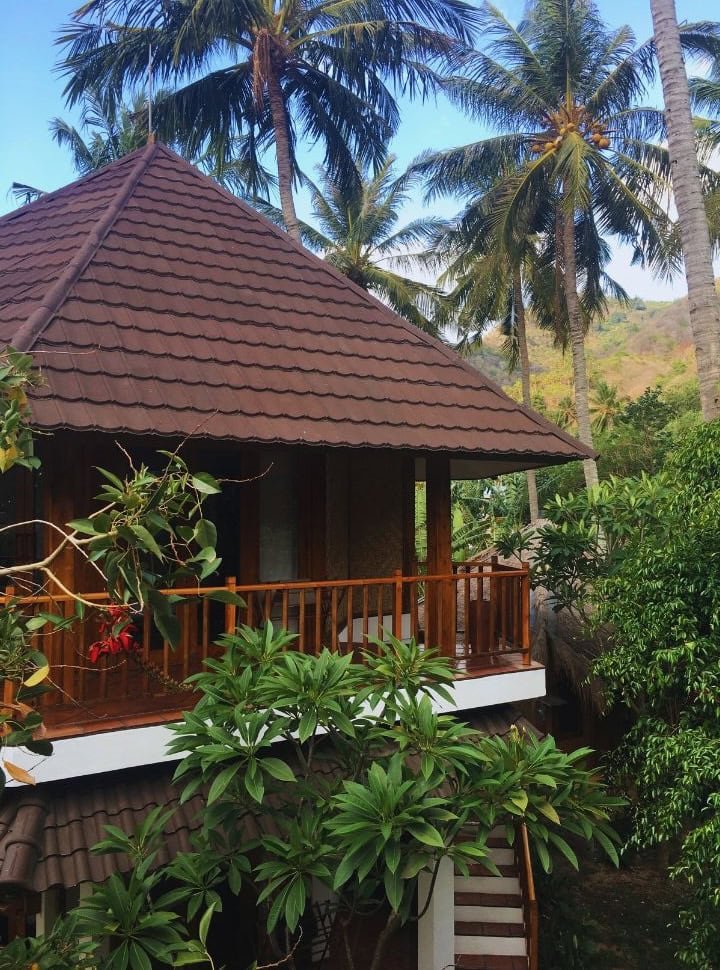 cottage like accommodation set within a green garden in Lombok