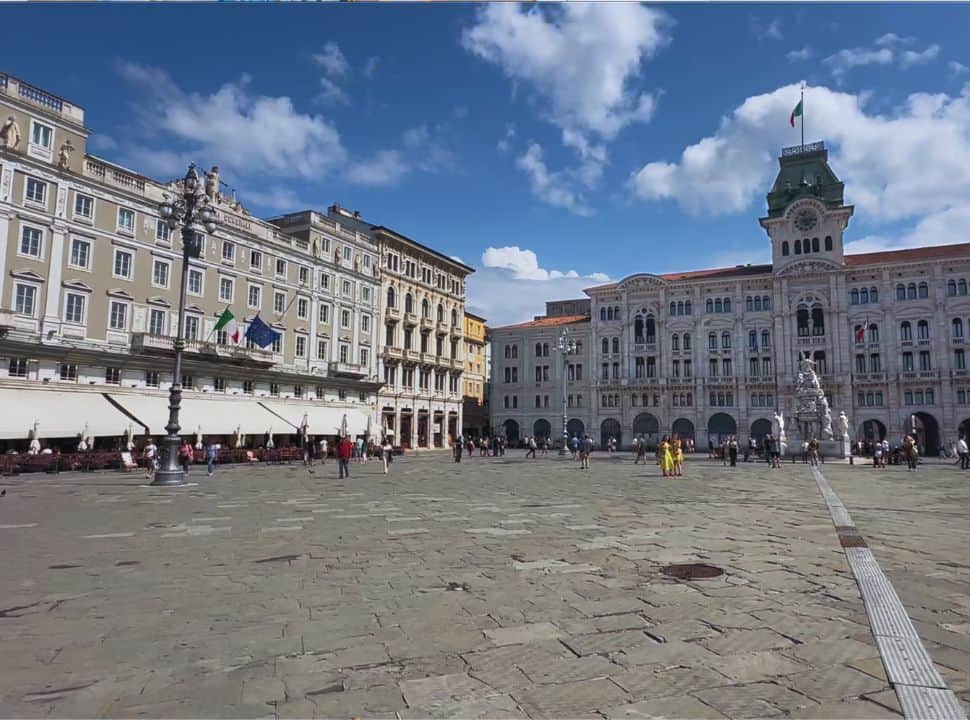 tall and large impressive buildings at a massive square in Trieste Italy