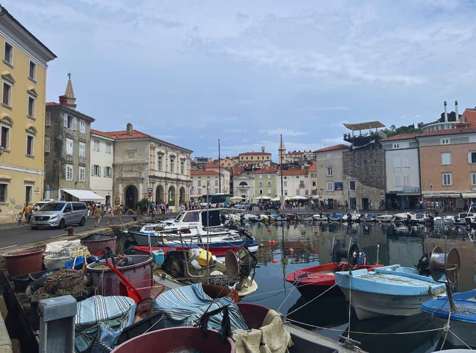 view of old town Piran Slovenia with harbor and historic colorful venetian styled buildings