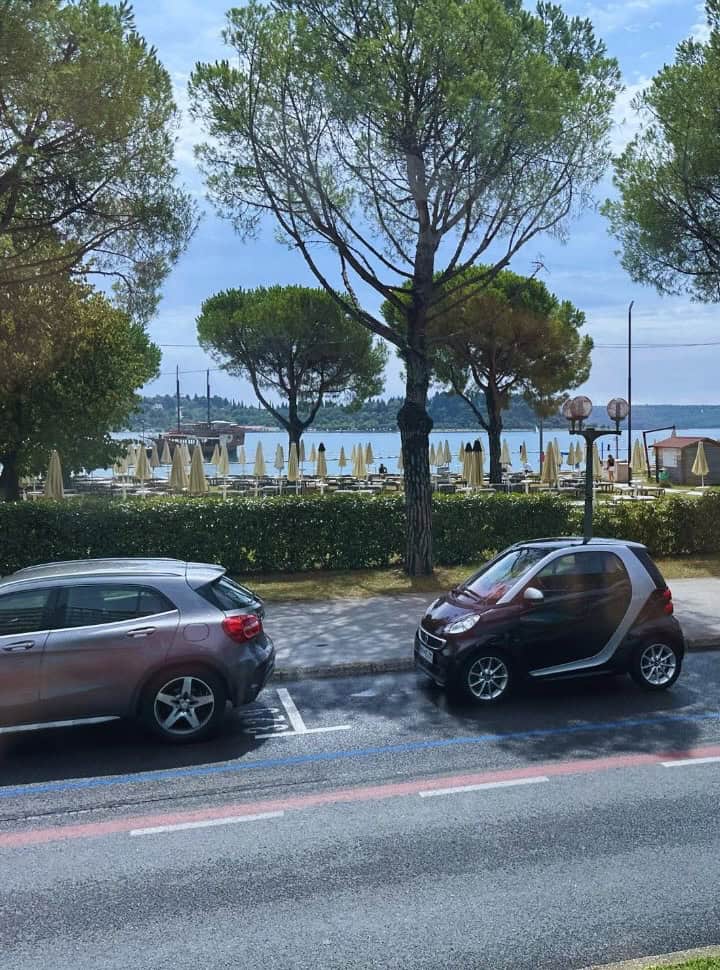 beach with sun loungers and beds along at the beach in Portorož Slovenia